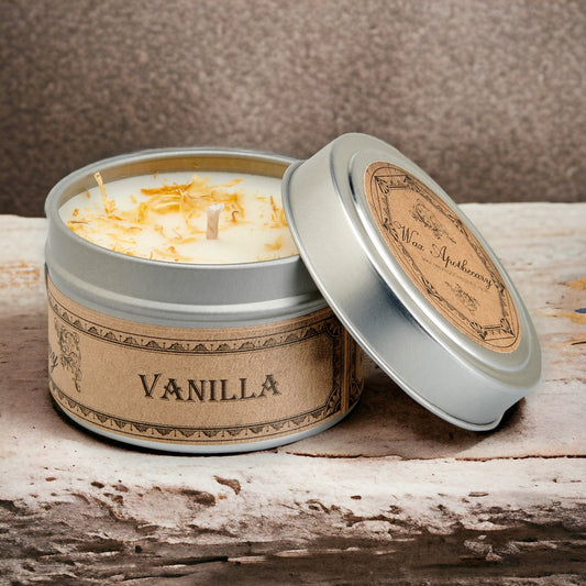 Candela botanica alla vaniglia in latta da viaggio