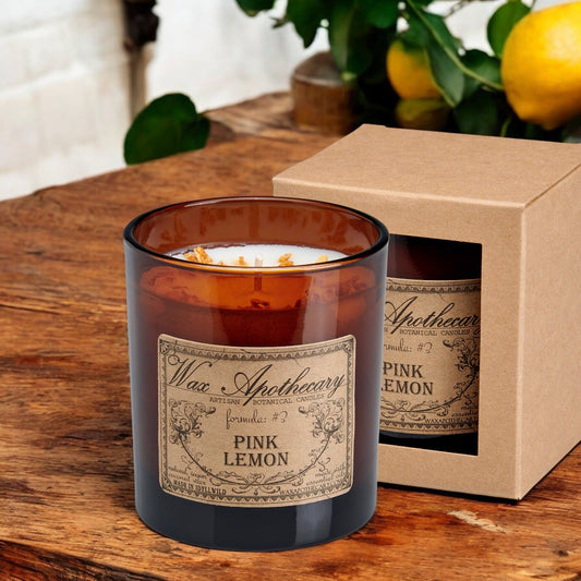 Candela artigianale in vetro ambrato Pink Lemon da 9 oz