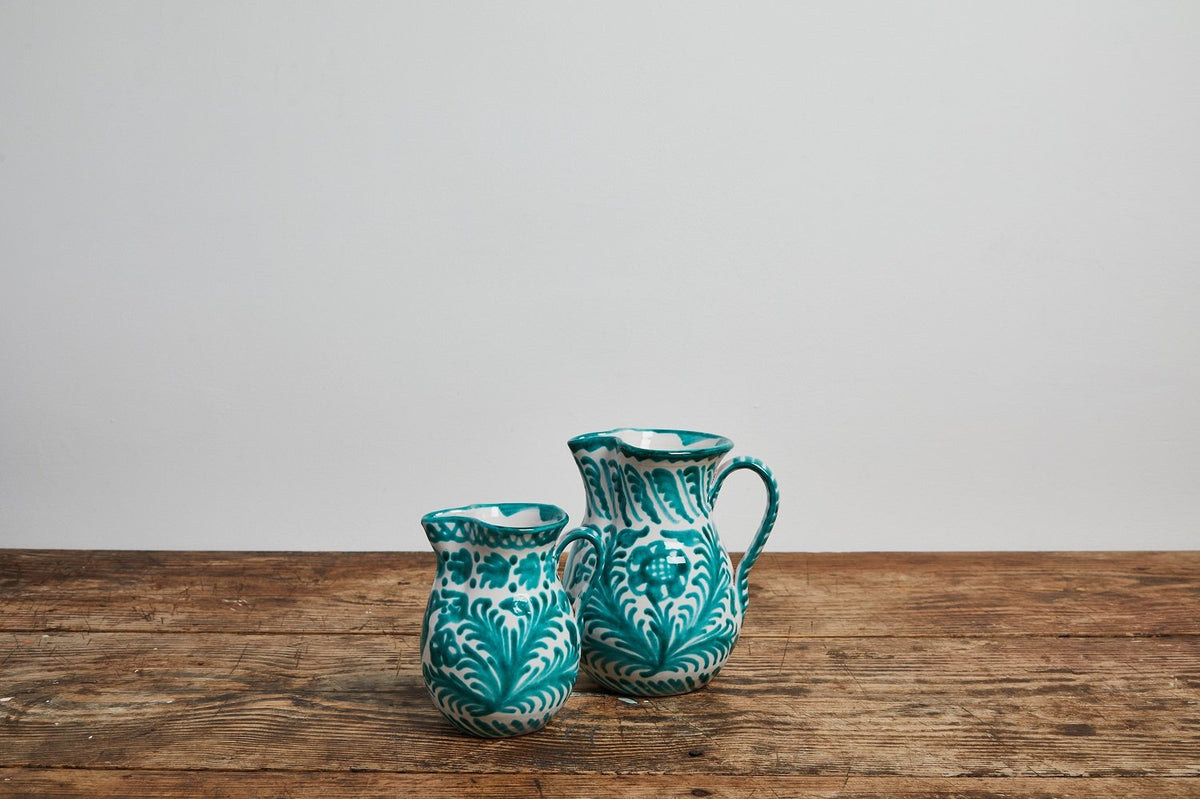Medium pitcher with hand painted designs