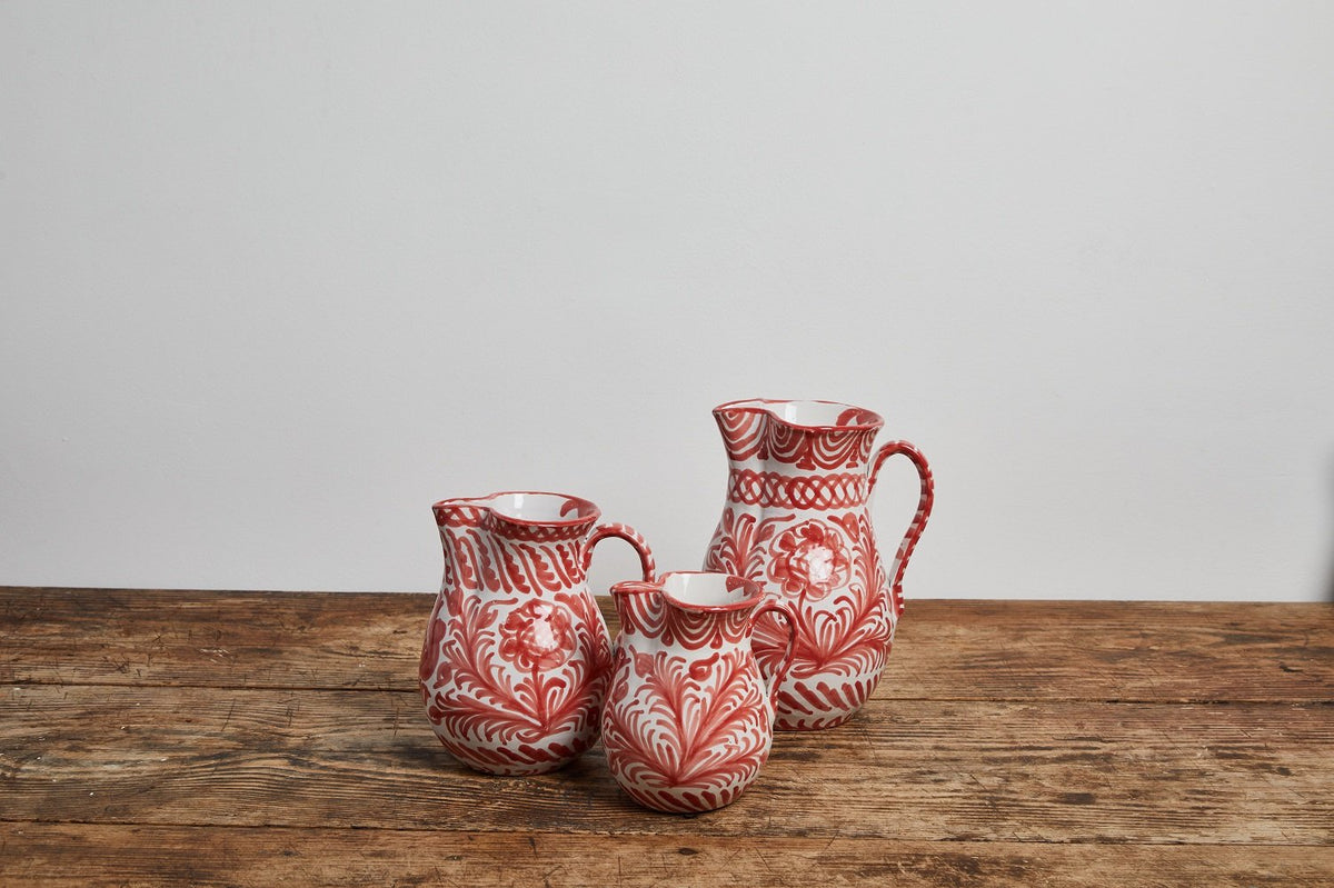 Medium pitcher with hand painted designs