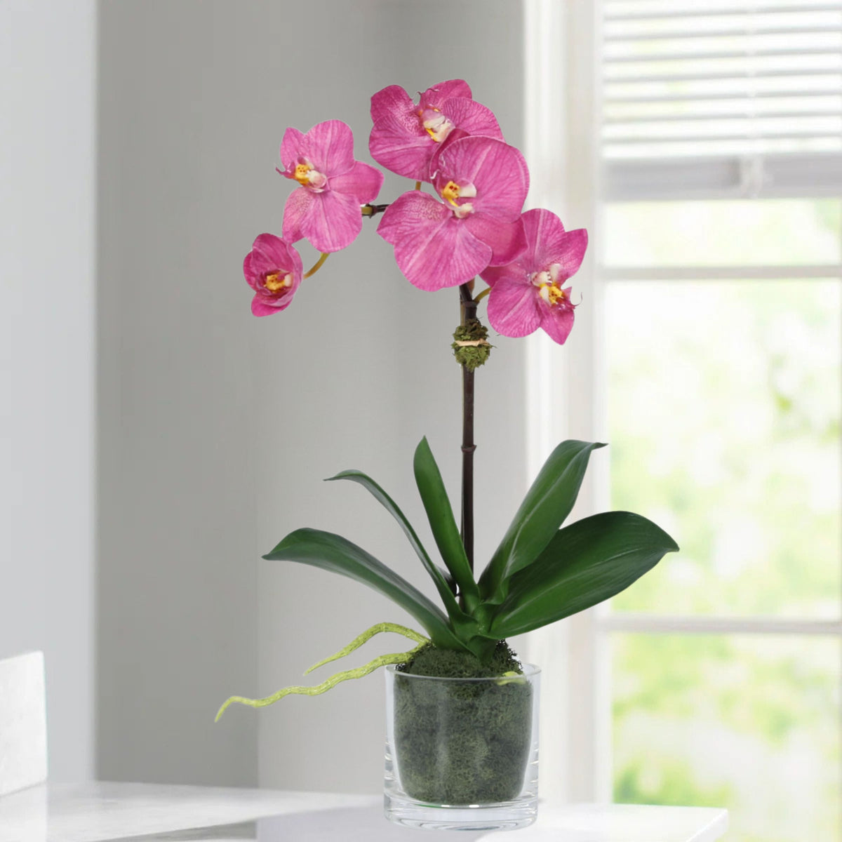Faux Orchid Plant in Glass Vase