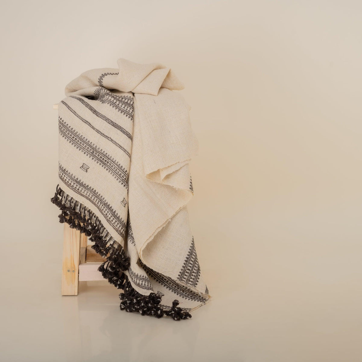 White Indian Wool Throw Blanket, Handwoven Bed Coverlet with Peaceful Reading Chair Accent - VAJRA